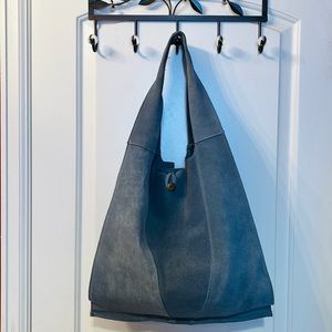 Blue suede bohos handbag.